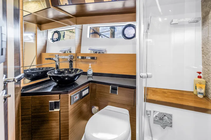 Slide: The Image of Luxurious bathroom in 2022 OKEAN 50 Flybridge yacht with modern fixtures and elegant design. - 47