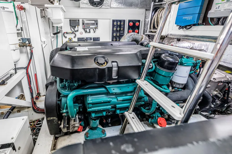 Slide: The Image of Engine room of 2022 OKEAN 50 Flybridge yacht, showcasing machinery and equipment. - 108
