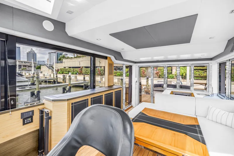 Slide: The Image of Luxurious interior of 2022 OKEAN 50 Flybridge yacht with modern design and waterfront view. - 32