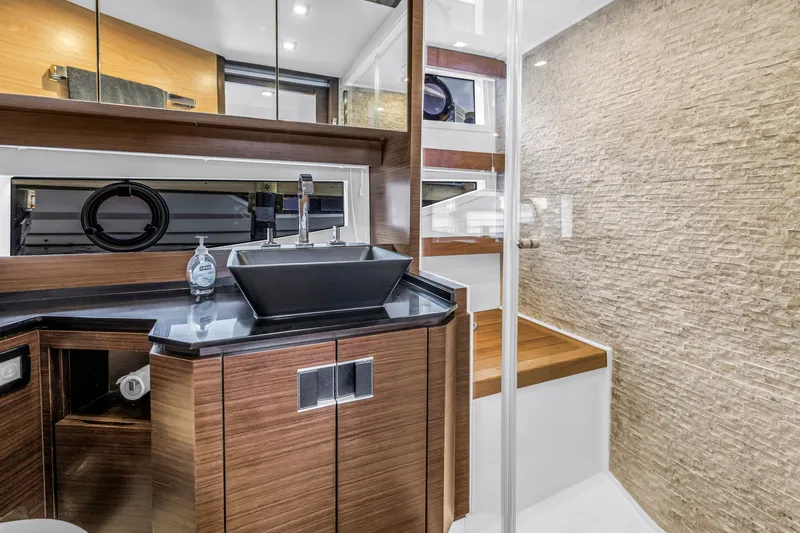 Slide: The Image of Luxurious bathroom interior of 2022 OKEAN 50 Flybridge yacht with modern fixtures. - 48