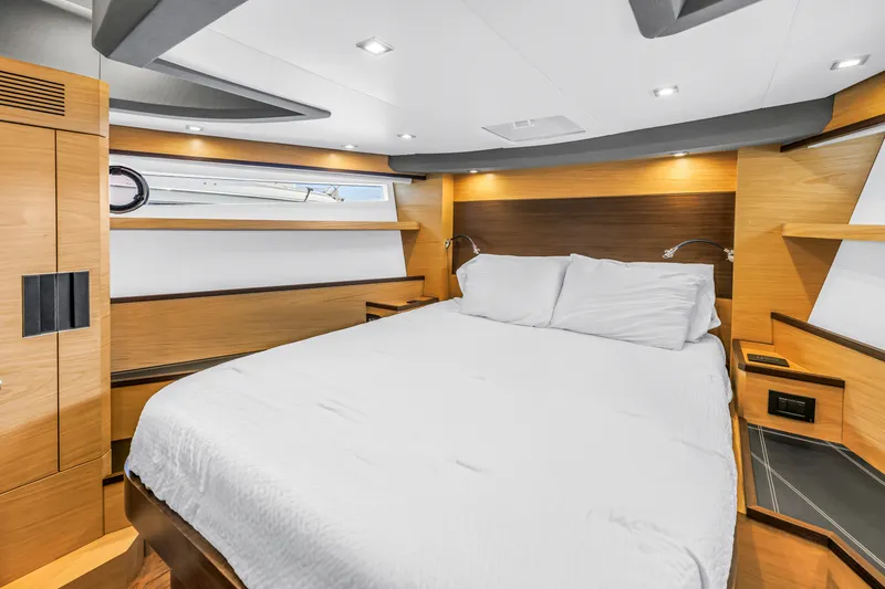 Slide: The Image of Luxurious cabin interior of 2022 OKEAN 50 Flybridge yacht with modern wood finishes. - 40