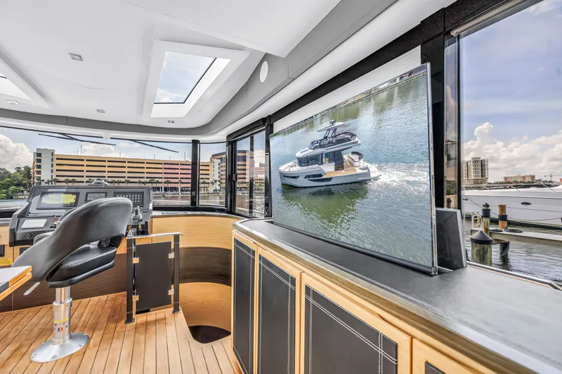 Slide: The Image of Interior of 2022 OKEAN 50 Flybridge yacht with modern helm and large windows. - 86