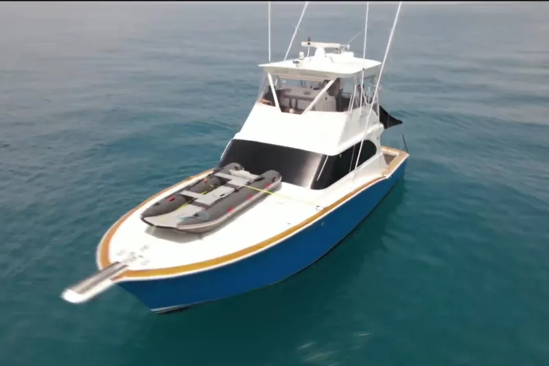 The Image of 2006 Jersey Cape 44 Convertible yacht on calm blue waters. - 1