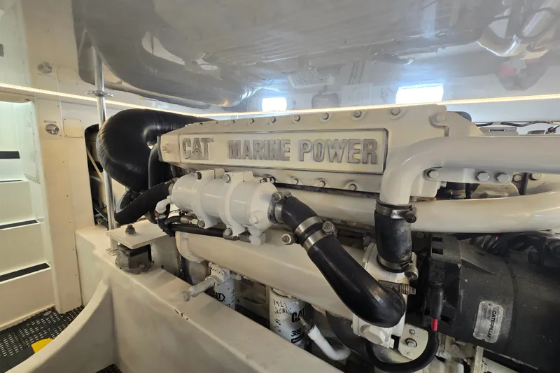 Slide: The Image of Engine room of 2006 Jersey Cape 44 Convertible with CAT Marine Power engine. - 44