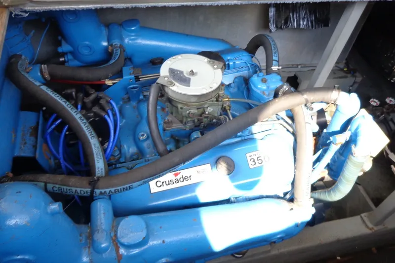 Slide: The Image of Engine compartment of a 1987 Tollycraft 34 Convertible Sedan with Crusader Marine engine. - 32