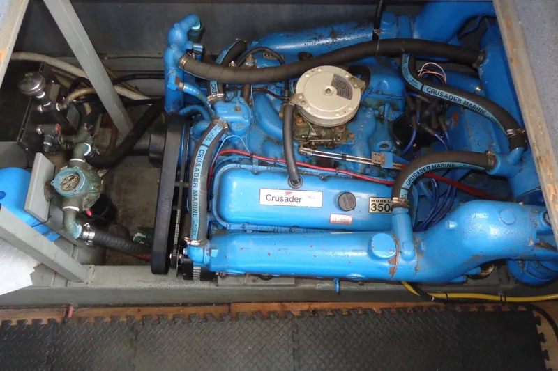 Slide: The Image of Engine compartment of a 1987 Tollycraft 34 Convertible Sedan with Crusader Marine engine. - 31