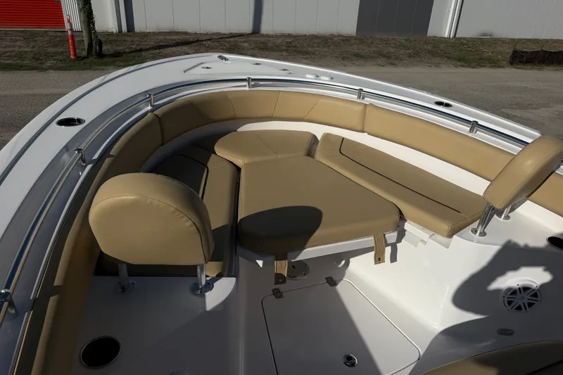 Slide: The Image of 2025 Sportsman Heritage 231 Center Console boat with tan seating and spacious deck layout. - 15