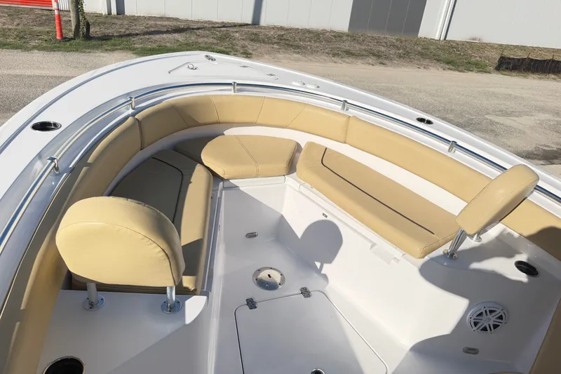Slide: The Image of 2025 Sportsman Heritage 231 Center Console boat with tan seating and spacious deck layout. - 37