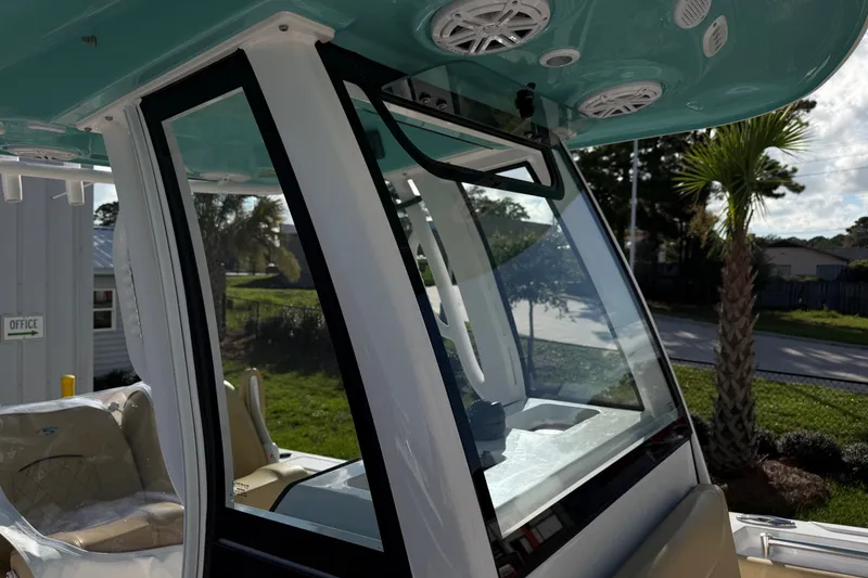 Slide: The Image of 2025 Sportsman Heritage 231 Center Console boat with sleek design and modern features. - 24
