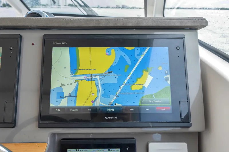 Slide: The Image of Garmin GPS display on 2018 Pursuit DC 365 Dual Console boat, showing nautical map. - 41