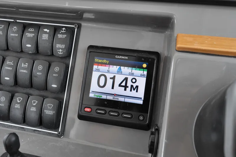 Slide: The Image of Control panel of 2018 Pursuit DC 365 Dual Console with Garmin display. - 45