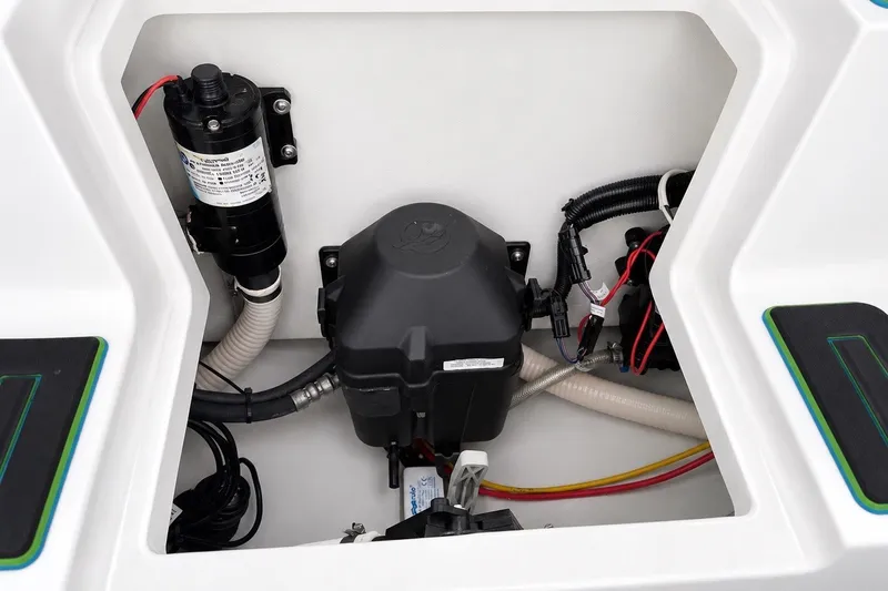 Slide: The Image of 2017 Statement 380 Open boat compartment with wiring and pump system. - 44
