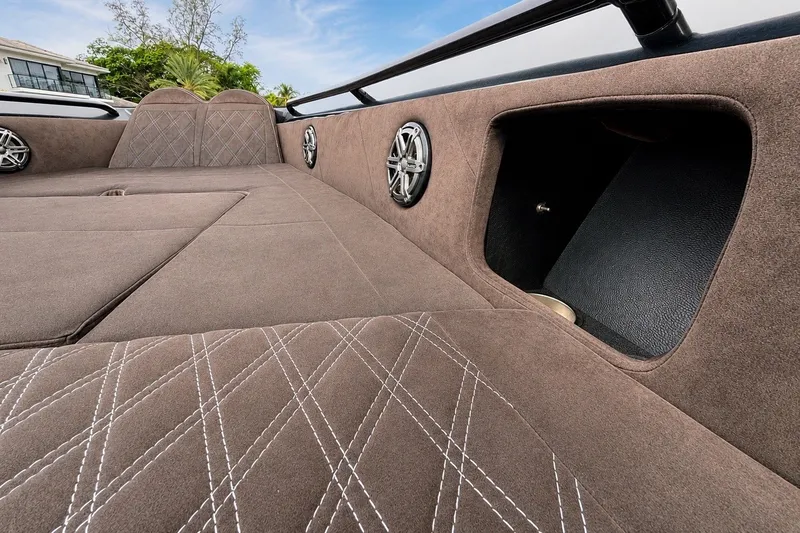 Slide: The Image of Luxurious interior of 2017 Statement 380 Open boat with plush seating and speakers. - 32