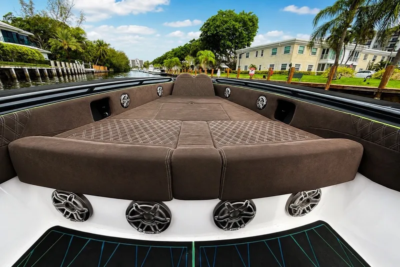 Slide: The Image of Luxurious 2017 Statement 380 Open boat interior with plush seating and scenic canal view. - 33
