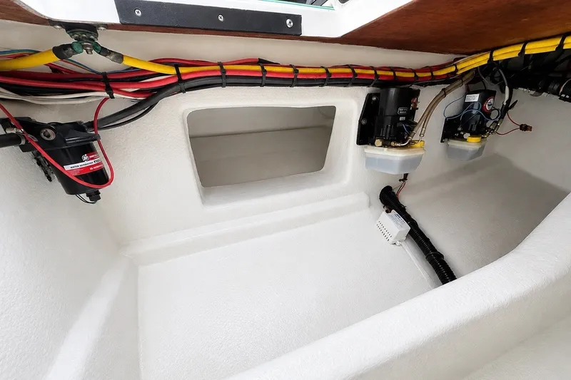 Slide: The Image of Interior view of a 2017 Statement 380 Open boat, showcasing wiring and components. - 47