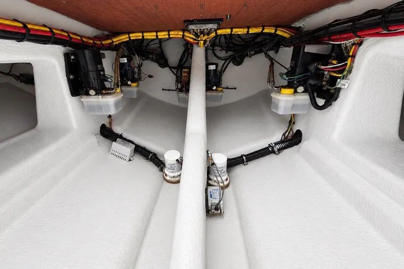 Slide: The Image of Interior view of a 2017 Statement 380 Open boat, showcasing wiring and mechanical components. - 45