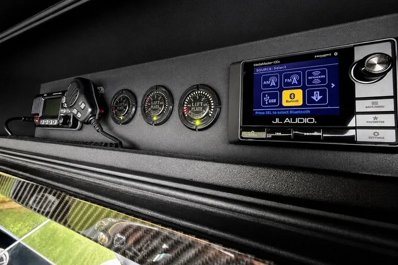 Slide: The Image of Control panel of a 2017 Statement 380 Open boat with JL Audio system. - 25