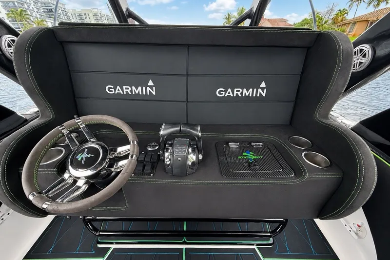 Slide: The Image of Cockpit of 2017 Statement 380 Open boat with Garmin navigation system and sleek steering wheel. - 24