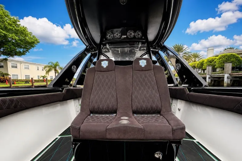 Slide: The Image of Luxurious interior of 2017 Statement 380 Open boat with plush seating and scenic background. - 35