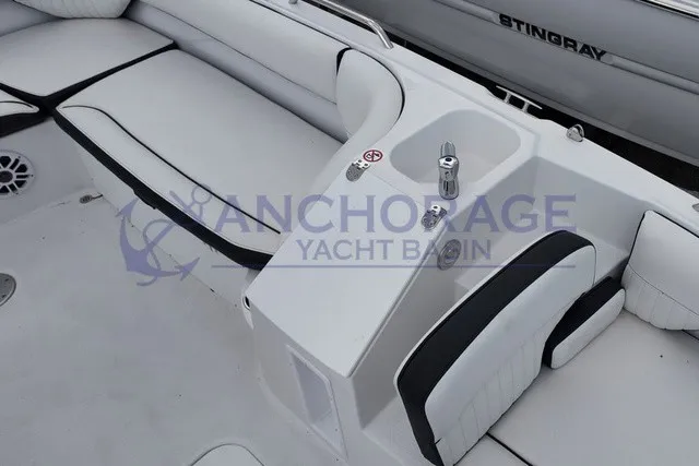 Slide: The Image of Interior of the 2027 Stingray 20 SC with white upholstery and black accents. - 10