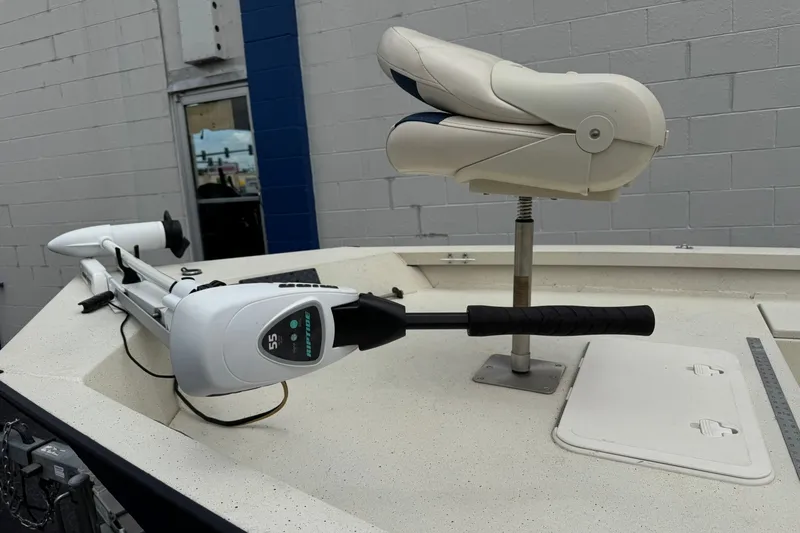 Slide: The Image of 2018 G3 Bay 18 DLX boat with trolling motor and adjustable seat on deck. - 2