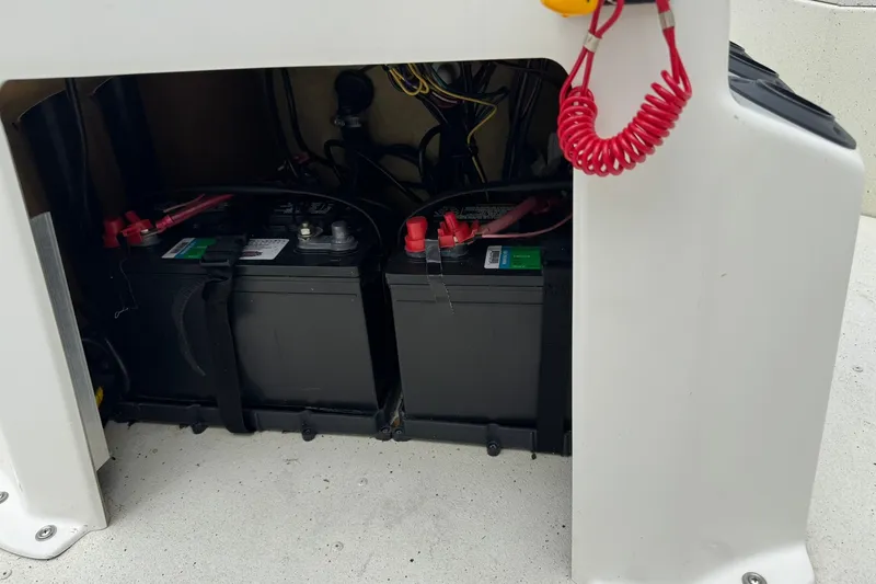 Slide: The Image of Batteries installed in a 2018 G3 Bay 18 DLX boat compartment. - 7