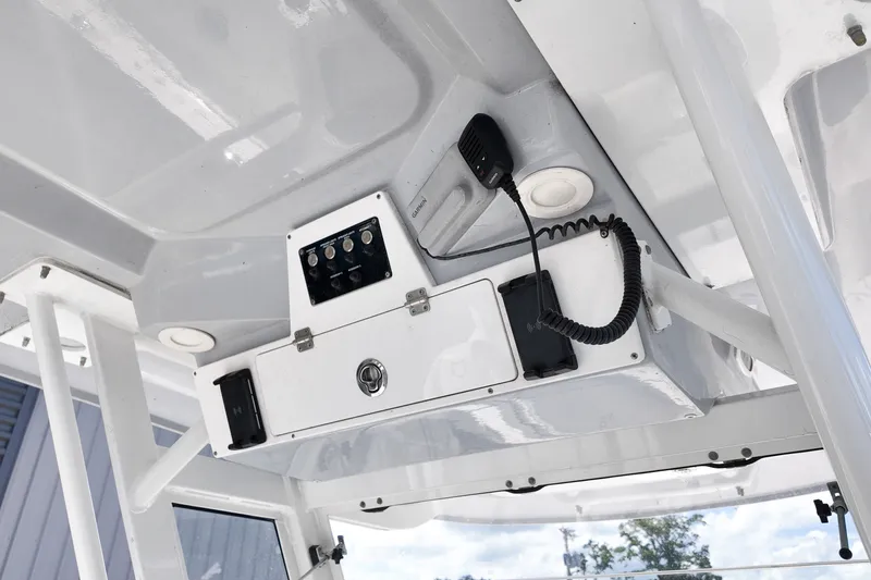 Slide: The Image of 2025 Sea Fox 328 Commander boat console with radio and control panel. - 14