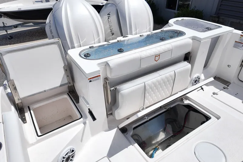 Slide: The Image of 2025 Sea Fox 328 Commander boat interior with storage compartments and seating. - 8