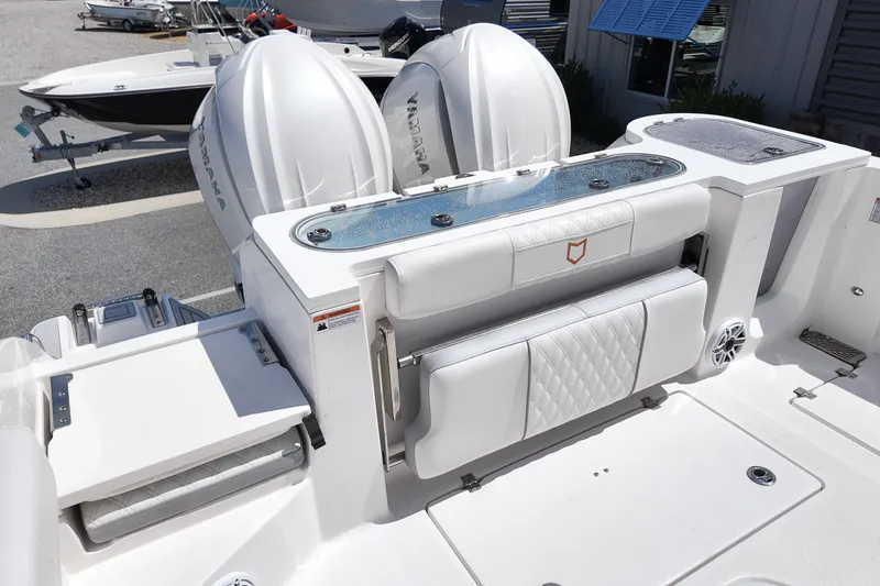 Slide: The Image of 2025 Sea Fox 328 Commander boat with dual Yamaha engines and luxurious seating. - 7