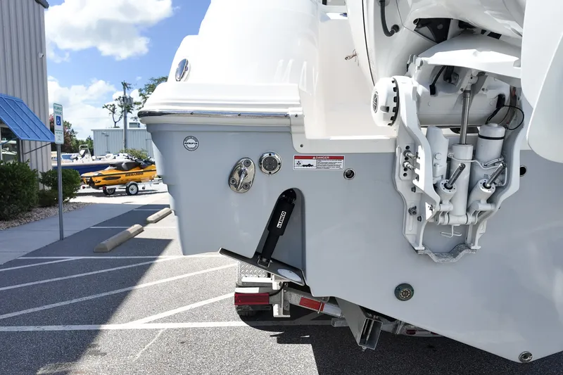 Slide: The Image of 2025 Sea Fox 328 Commander boat stern with engine and hydraulic components. - 3