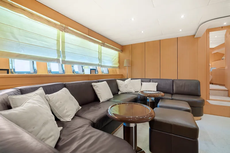 Slide: The Image of Luxurious interior of 2007 Mangusta 72 Motor Yacht with leather seating and elegant decor. - 36