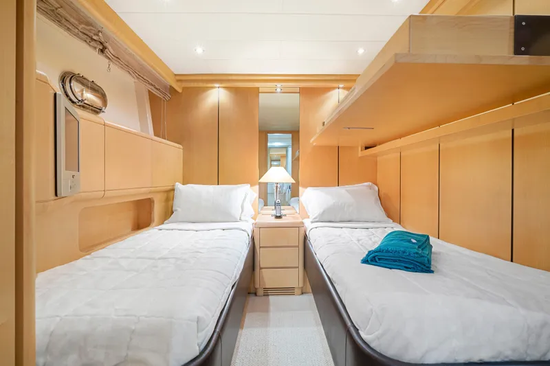 Slide: The Image of Luxurious twin cabin interior of 2007 Mangusta 72 Motor Yacht with modern wood finish. - 43