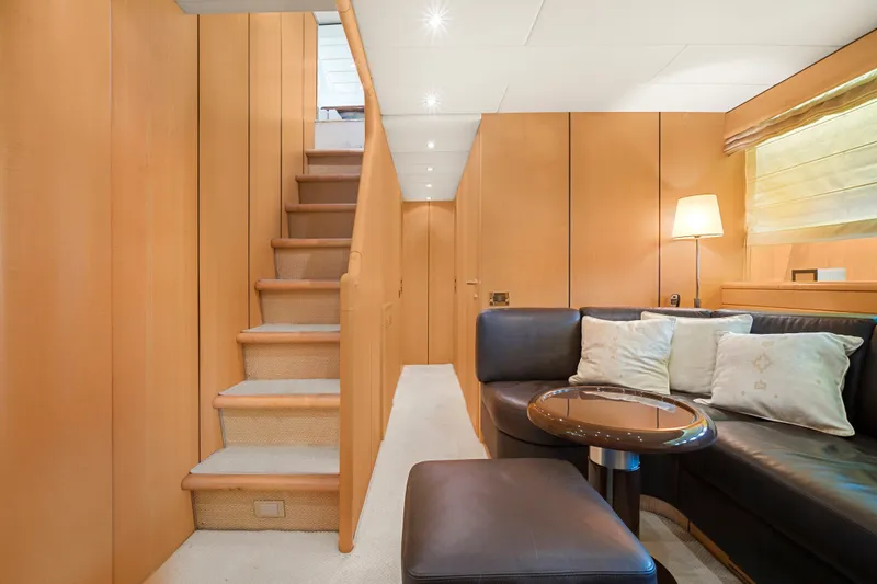 Slide: The Image of Luxurious interior of 2007 Mangusta 72 Motor Yacht with cozy seating and elegant lighting. - 34