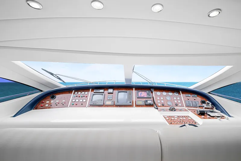 Slide: The Image of Cockpit of 2007 Mangusta 72 Motor Yacht with ocean view and control panel. - 22