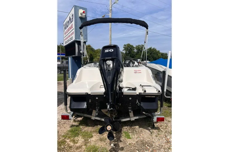 Slide: The Image of 2024 Bayliner Element M15 boat with outboard motor, displayed at Aloha Marine. - 1