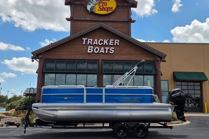 The Image of 2026 Sun Tracker Party Barge 20 DLX pontoon boat displayed at Tracker Boats store. - 0