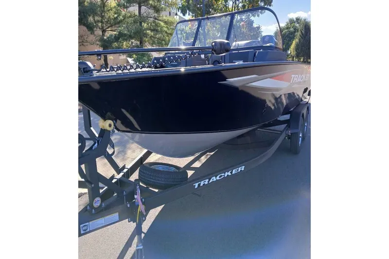 Slide: The Image of 2026 Tracker Targa V-19 WT boat on trailer, parked outdoors. - 80
