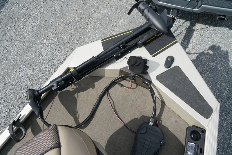 Slide: The Image of 2009 G3 Eagle 170 boat deck with trolling motor and control panel. - 13