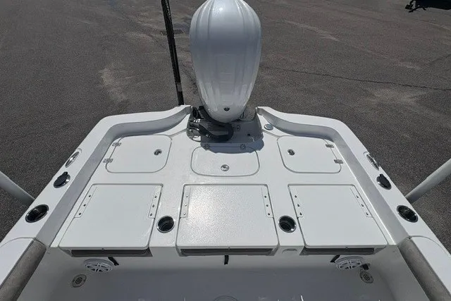 Slide: The Image of 2026 Sea Hunt BX25FS boat deck with storage compartments and fishing rod holders. - 4