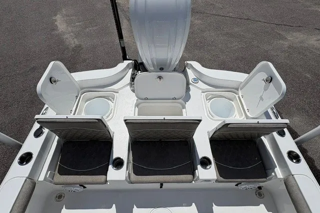 Slide: The Image of 2026 Sea Hunt BX25FS boat interior with open storage compartments and seating. - 5