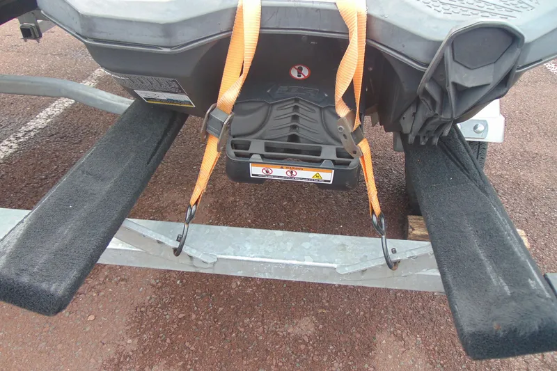 Slide: The Image of 2015 Sea-Doo Spark 2up secured on trailer with orange straps. - 6
