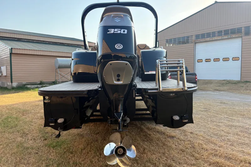 Slide: The Image of Rear view of a 2019 SunCatcher Amara boat with a 350 horsepower engine. - 8