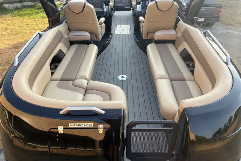 Slide: The Image of Luxurious 2019 SunCatcher Amara boat interior with beige seating and sleek design. - 21
