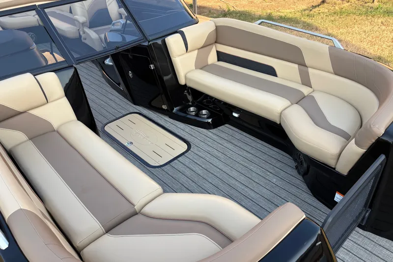 Slide: The Image of Luxurious interior of 2019 SunCatcher Amara boat with beige and brown seating. - 12