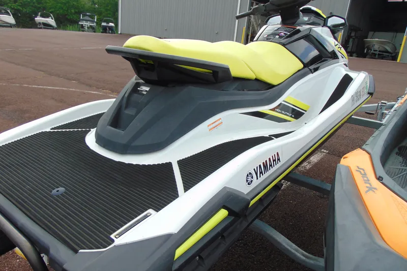 Slide: The Image of 2021 Yamaha WaveRunner VX with yellow seat on trailer, ready for water adventures. - 13