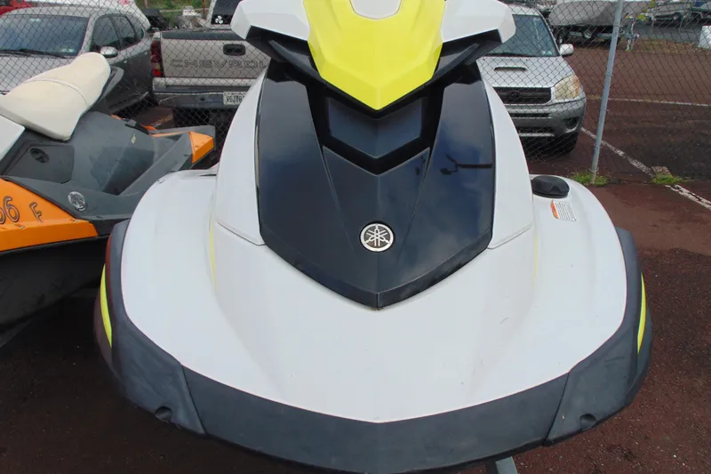 Slide: The Image of 2021 Yamaha WaveRunner VX jet ski in a parking lot, front view. - 4