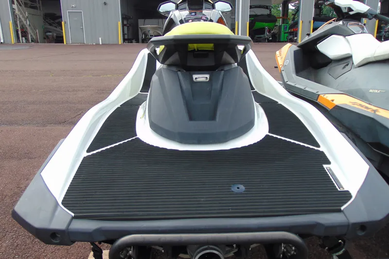 Slide: The Image of 2021 Yamaha WaveRunner VX jet ski parked on pavement, rear view. - 6