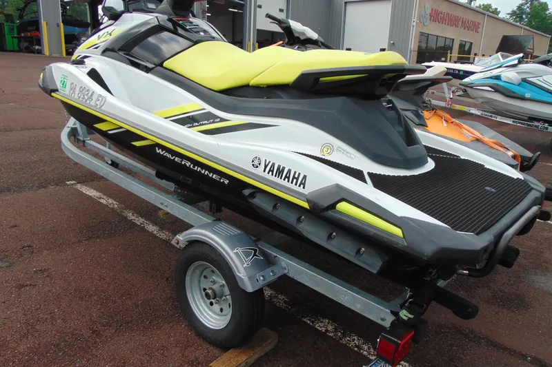 Slide: The Image of 2021 Yamaha WaveRunner VX on trailer, featuring sleek design and vibrant yellow accents. - 5