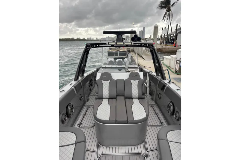 Slide: The Image of 2021 Midnight Express 37 Open boat interior with luxurious seating and modern design. - 11