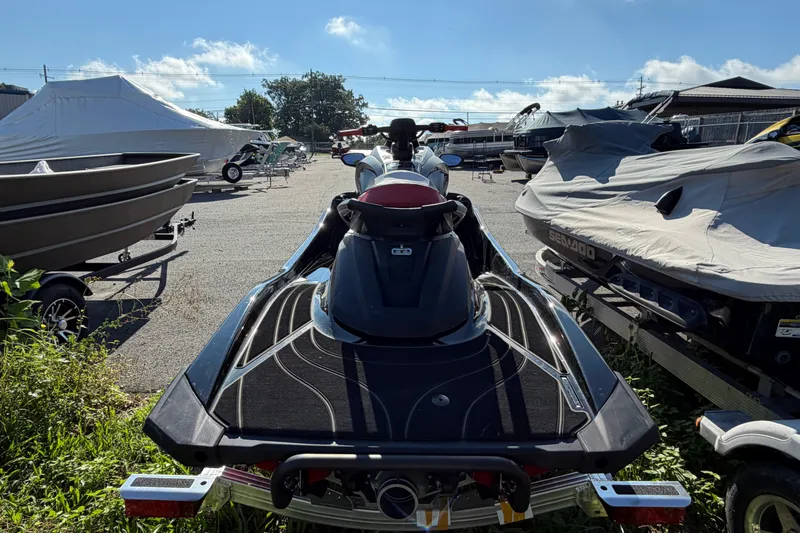 Slide: The Image of 2024 Yamaha WaveRunner GP HO jet ski parked in a marina lot. - 5